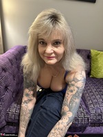 Inked MILF. Jeans Strip Free Pic 10