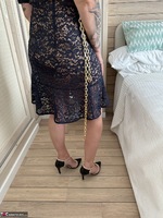 Inked MILF. Tight Black Dress and Purple Underwear Free Pic 7