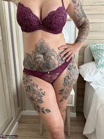 Inked MILF. Tight Black Dress and Purple Underwear Free Pic 12