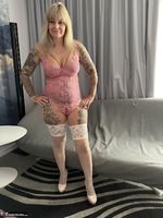 Inked MILF. Pink set with sexy white stockings Free Pic 1