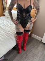 Inked MILF. Sexy basque and red thigh high boots Free Pic 3
