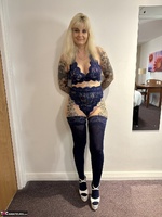 Inked MILF. Matching Top and Bottoms with Stockings and Heels Free Pic 1