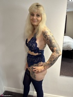 Inked MILF. Matching Top and Bottoms with Stockings and Heels Free Pic 2