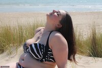 Cheeky Dee. More fun at the beach Free Pic 5