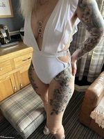 Inked MILF. White Body Lingerie and Killer Heels Free Pic 3