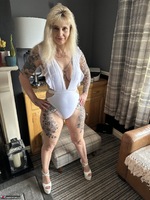 Inked MILF. White Body Lingerie and Killer Heels Free Pic 5