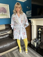 Inked MILF. Yellow can be sexy Free Pic 1