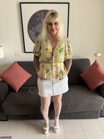 Inked MILF. Skirt and blouse comes off to reveal silky and smooth body Free Pic 1