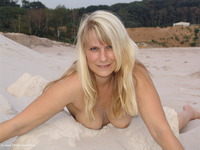 Red Lingerie in the sand featuring Sweet Susi