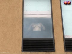 Busty Bliss - Hotel Window Gallery