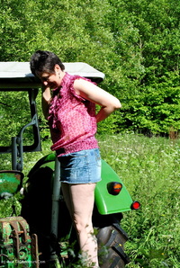 Stripping On The Tractor featuring Hot Milf