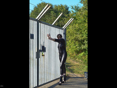 Hot Milf - Catsuit By The Gate Gallery