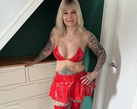 Red Hot PVC Boots and Baby Oil featuring Inked MILF Free Pic 1
