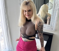 Hot Pink Mini Skirt and See Through Top featuring Inked MILF Free Pic 1