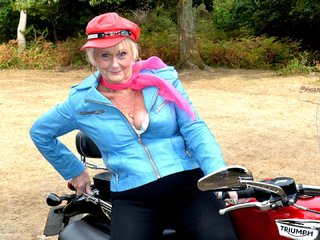 Sparkle - Leather GILF on a motorbike