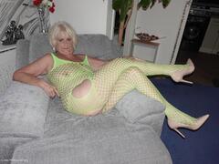 Sparkle - Wearing a bright yellow crutchless yellow body suit  Gallery