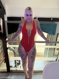 Creaming my tanned tits featuring Inked MILF