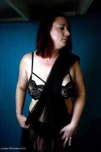 Studio Shoot In Black featuring Sara Banks